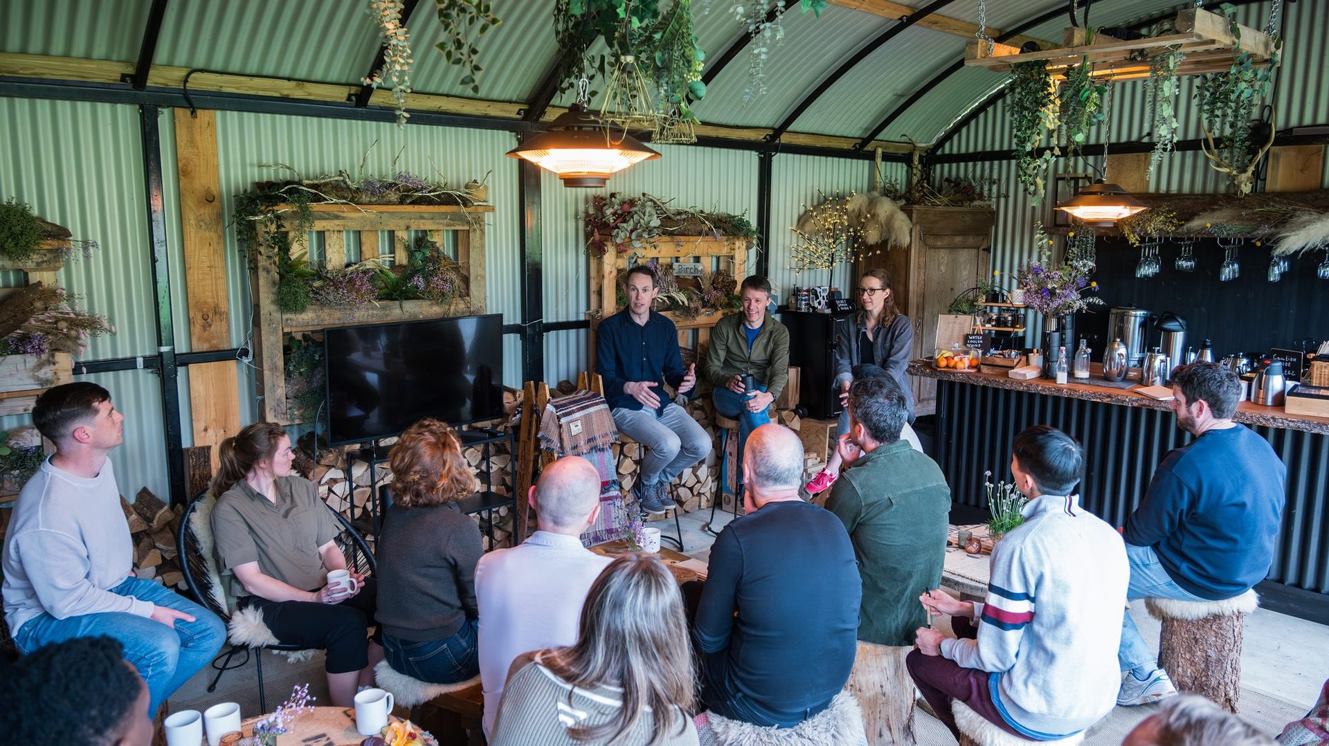Group dining at a long table, The Deerstone.